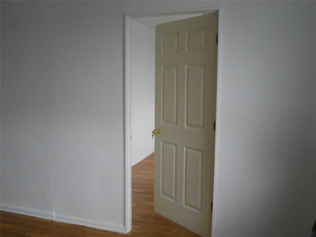 131-11KEWGARDENS Kew Gardens Rd Unit 4D, Richmond Hill, NY 11418 - unfurnished room with wood finished floors and baseboards