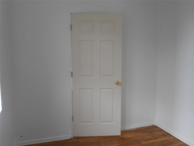 131-11KEWGARDENS Kew Gardens Rd Unit 4D, Richmond Hill, NY 11418 - spare room featuring wood finished floors and baseboards