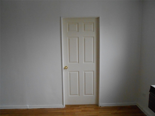 131-11KEWGARDENS Kew Gardens Rd Unit 4D, Richmond Hill, NY 11418 - unfurnished room featuring wood finished floors and baseboards