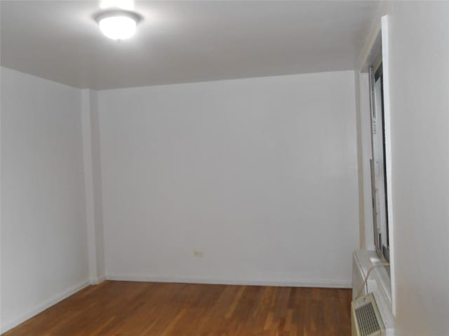 131-11KEWGARDENS Kew Gardens Rd Unit 4D, Richmond Hill, NY 11418 - spare room featuring wood finished floors