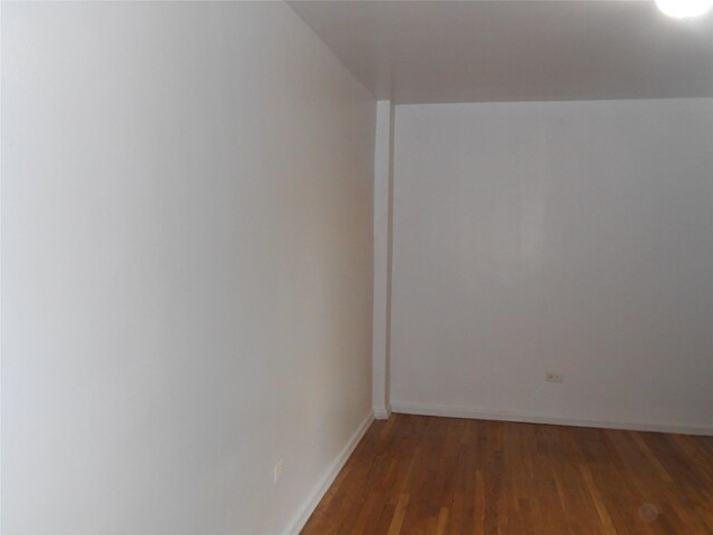 131-11KEWGARDENS Kew Gardens Rd Unit 4D, Richmond Hill, NY 11418 - spare room with wood finished floors and baseboards