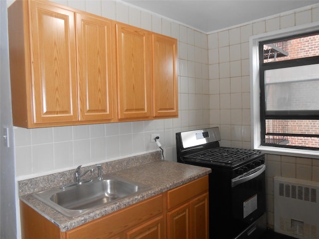 131-11KEWGARDENS Kew Gardens Rd Unit 4D, Richmond Hill, NY 11418 - kitchen featuring radiator, range with gas cooktop, a sink, and decorative backsplash