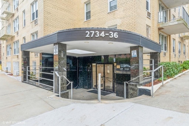 view of property featuring central AC unit