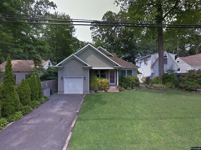 5 Schaefer St, Huntington Station, NY 11746 - view of front of property with driveway and an attached garage