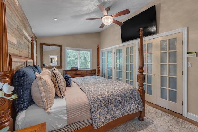 7 Tuxedo Dr, Melville, NY 11747 - bedroom with french doors, vaulted ceiling, wood finished floors, and a ceiling fan