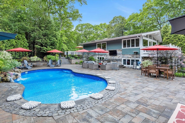 7 Tuxedo Dr, Melville, NY 11747 - outdoor pool featuring an outdoor hangout area, a patio, and outdoor dining space