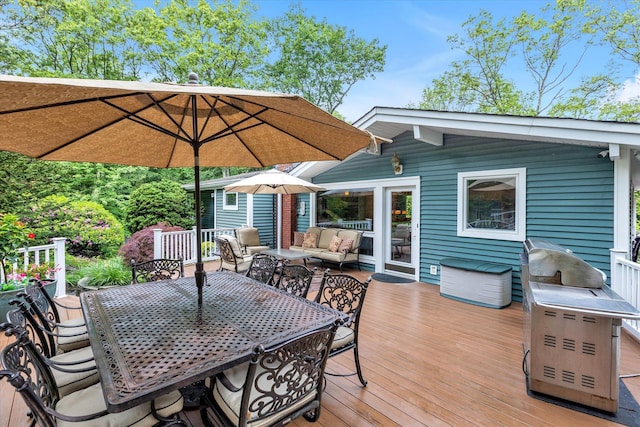 7 Tuxedo Dr, Melville, NY 11747 - wooden deck with outdoor dining space and outdoor lounge area