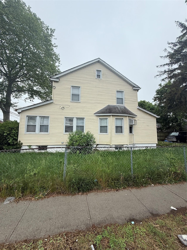 114-02 208th St, Saint Albans, NY 11411 - view of side of home featuring fence