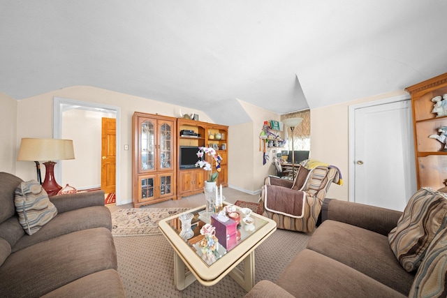 2816 215th Pl, Bayside, NY 11360 - carpeted living room featuring vaulted ceiling and baseboards