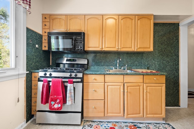 2816 215th Pl, Bayside, NY 11360 - kitchen featuring black microwave, stainless steel gas range, a sink, dark countertops, and light brown cabinets