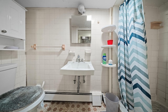 2816 215th Pl, Bayside, NY 11360 - bathroom featuring tile walls, toilet, a baseboard heating unit, tiled shower, and a sink