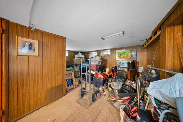 2816 215th Pl, Bayside, NY 11360 - below grade area featuring wooden walls and wood finished floors