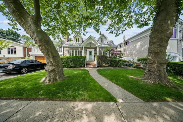 2816 215th Pl, Bayside, NY 11360 - view of front of home with a front yard and stone siding