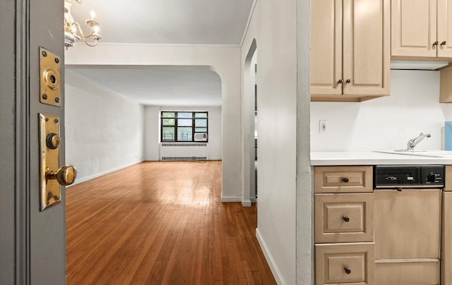 67-71 Yellowstone Blvd Unit 3-L, Forest Hills, NY 11375 - kitchen with radiator heating unit, dishwashing machine, dark wood finished floors, light countertops, and a sink