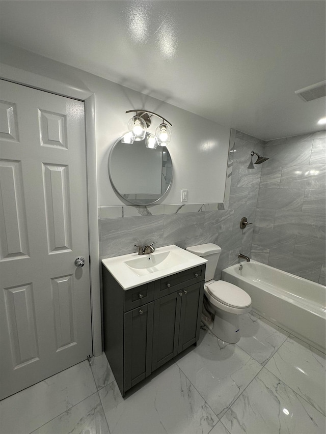 107 Norwood Ave, Northport, NY 11768 - full bathroom with vanity, marble look tiles, shower / tub combination, toilet, and tile walls