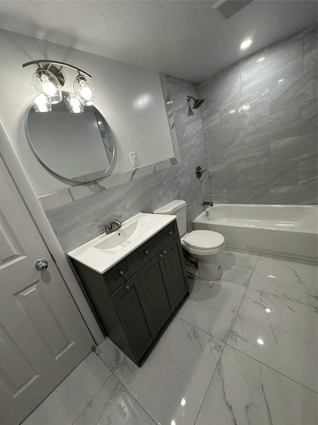 107 Norwood Ave, Northport, NY 11768 - full bath featuring marble look tiles, vanity, toilet, and tub / shower combination