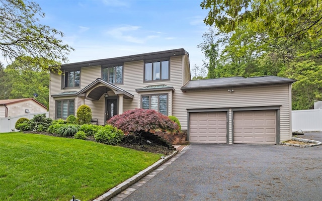 94 Stonehurst Ln, Dix Hills, NY 11746 - view of front of home featuring driveway and an attached garage