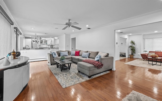 94 Stonehurst Ln, Dix Hills, NY 11746 - living room with hardwood / wood-style floors, a baseboard radiator, ceiling fan, ornamental molding, and recessed lighting