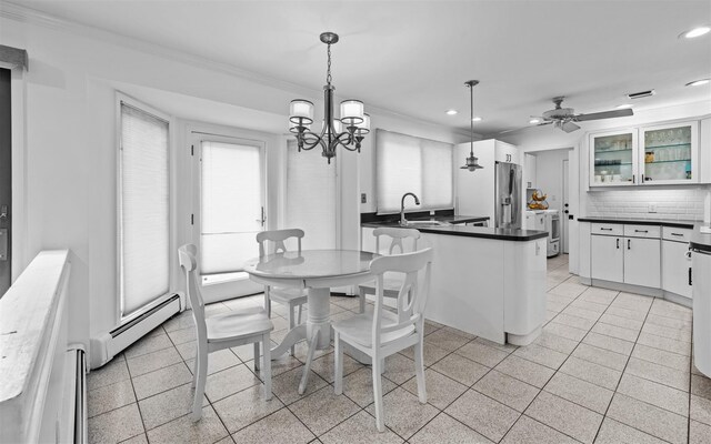 94 Stonehurst Ln, Dix Hills, NY 11746 - dining space with recessed lighting, ornamental molding, baseboard heating, ceiling fan, and a chandelier