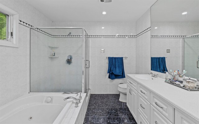 94 Stonehurst Ln, Dix Hills, NY 11746 - bathroom with vanity, a jetted tub, a shower stall, marble finish floors, and recessed lighting