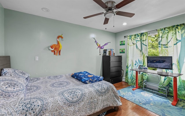 94 Stonehurst Ln, Dix Hills, NY 11746 - bedroom featuring wood finished floors, recessed lighting, and a ceiling fan