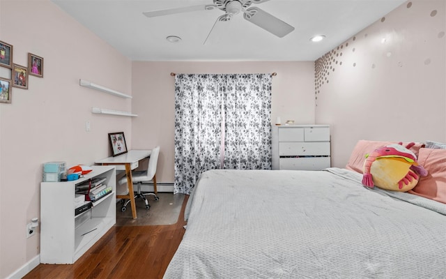 94 Stonehurst Ln, Dix Hills, NY 11746 - bedroom with wood finished floors, baseboard heating, baseboards, ceiling fan, and recessed lighting