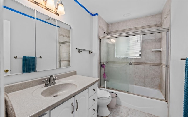 94 Stonehurst Ln, Dix Hills, NY 11746 - full bath featuring tile patterned floors, vanity, toilet, and bath / shower combo with glass door