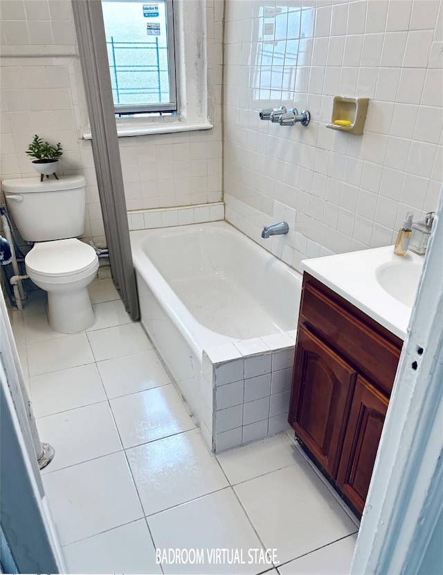 1898 Longfellow Ave Unit E4, Bronx, NY 10460 - bathroom with tile walls, tile patterned flooring, a bathtub, toilet, and vanity