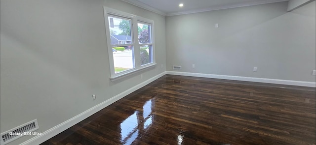 151 Boylston St, Hempstead, NY 11550 - spare room featuring crown molding, baseboards, dark wood-style floors, and recessed lighting