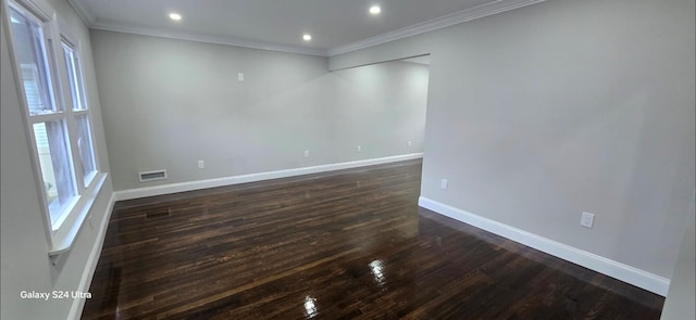 151 Boylston St, Hempstead, NY 11550 - empty room with dark wood-type flooring, baseboards, crown molding, healthy amount of natural light, and recessed lighting