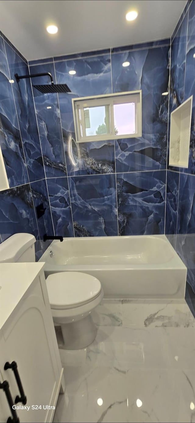 151 Boylston St, Hempstead, NY 11550 - bathroom featuring tile walls, marble finish floors, toilet, vanity, and recessed lighting