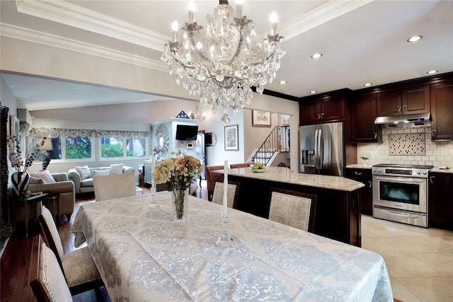 dining area featuring crown molding, stairs, a chandelier, light tile patterned floors, and recessed lighting