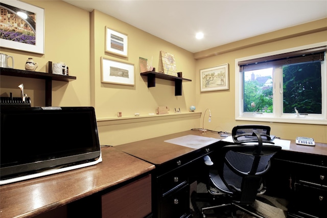 office space featuring built in desk