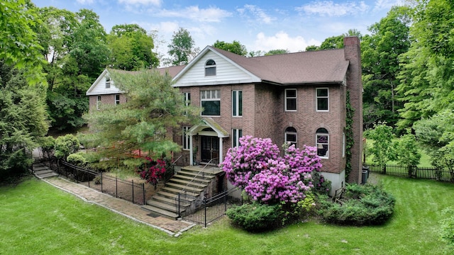 3893 Rte 82, Millbrook, NY 12545 - view of front of home featuring a chimney, brick siding, and stairs