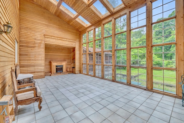 3893 Rte 82, Millbrook, NY 12545 - unfurnished sunroom with a skylight and lofted ceiling
