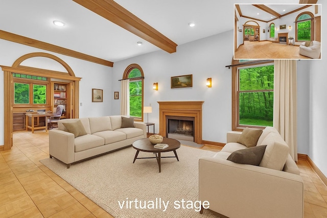 3893 Rte 82, Millbrook, NY 12545 - living area with beamed ceiling, a fireplace with flush hearth, plenty of natural light, recessed lighting, and baseboards