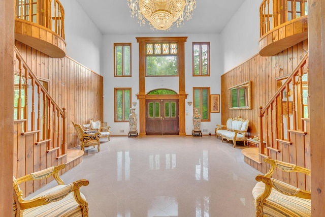 3893 Rte 82, Millbrook, NY 12545 - foyer featuring a high ceiling, healthy amount of natural light, stairway, and a chandelier