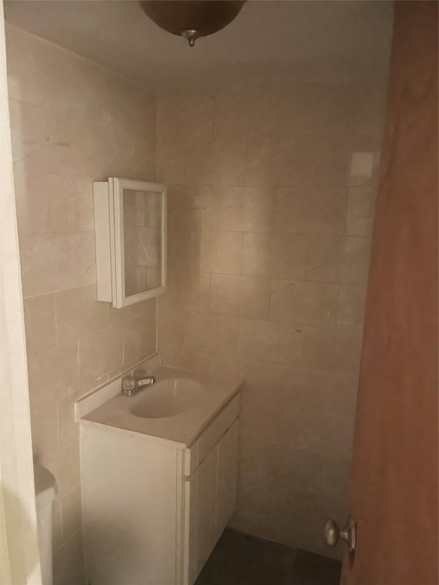 3418 Irwin Ave, Bronx, NY 10463 - bathroom featuring vanity and tile walls
