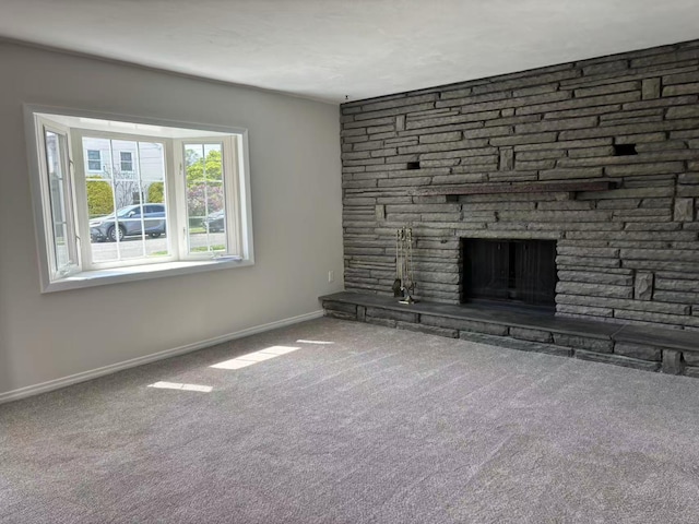 2333 Beech St, Wantagh, NY 11793 - unfurnished living room featuring carpet flooring, baseboards, and a fireplace