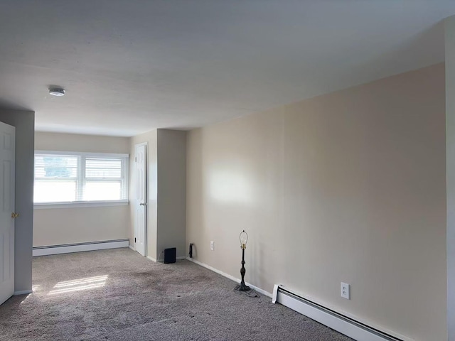 2333 Beech St, Wantagh, NY 11793 - carpeted empty room with baseboard heating, baseboards, and a smoke detector