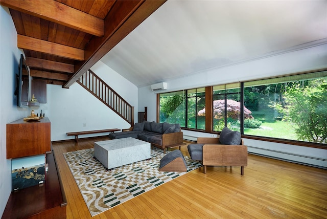 1 Ridge Rd, Tuxedo Park, NY 10987 - living area with stairway, wood-type flooring, a baseboard heating unit, a wall mounted air conditioner, and beam ceiling