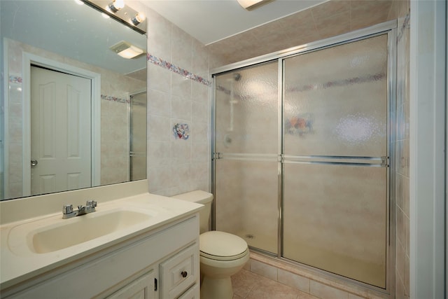 1 Ridge Rd, Tuxedo Park, NY 10987 - full bathroom with a shower stall, tile patterned flooring, toilet, tile walls, and vanity