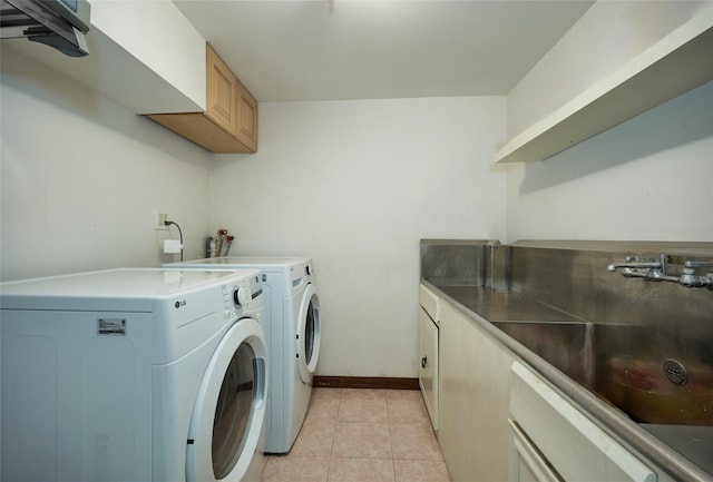 1 Ridge Rd, Tuxedo Park, NY 10987 - washroom featuring separate washer and dryer, light tile patterned floors, cabinet space, and baseboards
