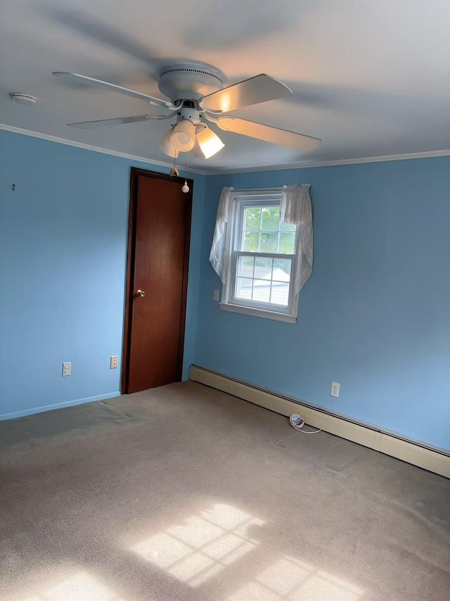 2090 Post St, East Meadow, NY 11554 - empty room with a baseboard radiator, crown molding, carpet flooring, a ceiling fan, and baseboards