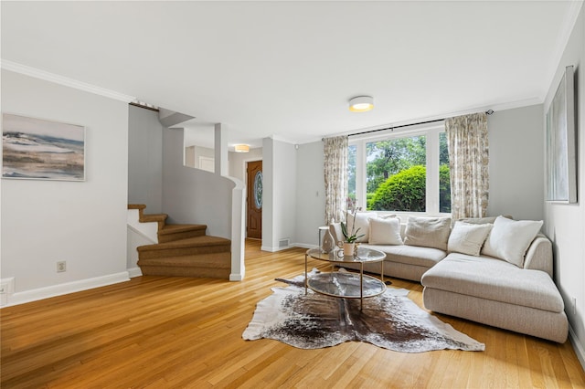 287 Harrison Ave, Harrison, NY 10528 - living room with crown molding, light wood-style floors, and stairway