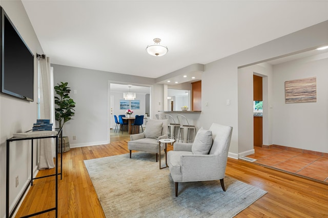 287 Harrison Ave, Harrison, NY 10528 - living area featuring light wood-type flooring and baseboards