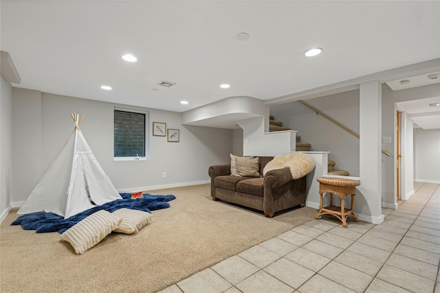 287 Harrison Ave, Harrison, NY 10528 - living room featuring stairs, light carpet, recessed lighting, and light tile patterned flooring