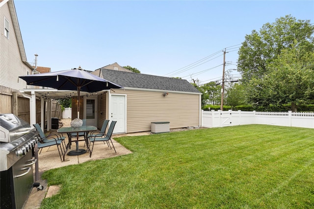 287 Harrison Ave, Harrison, NY 10528 - fenced backyard with a patio, an outdoor structure, and outdoor dining area