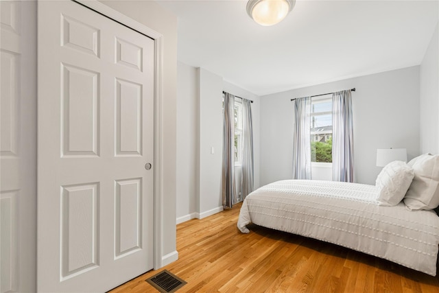 287 Harrison Ave, Harrison, NY 10528 - bedroom with light wood-type flooring and baseboards