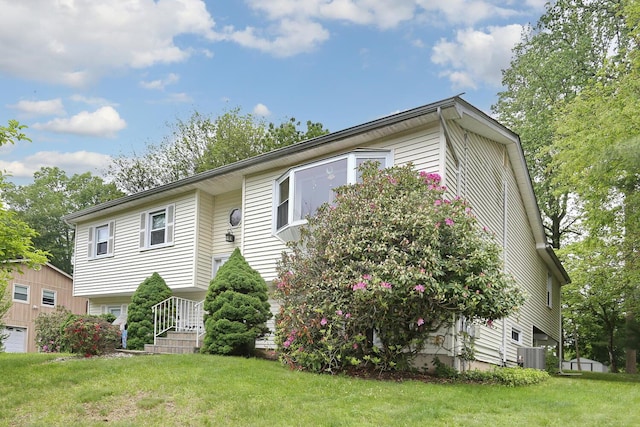29 Park Ter, Valley Cottage, NY 10989 - view of front facade with cooling unit and a front lawn